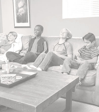 Furniture Cleaning Stanley Steemer Young Kids Sitting On A Couch In Living Room