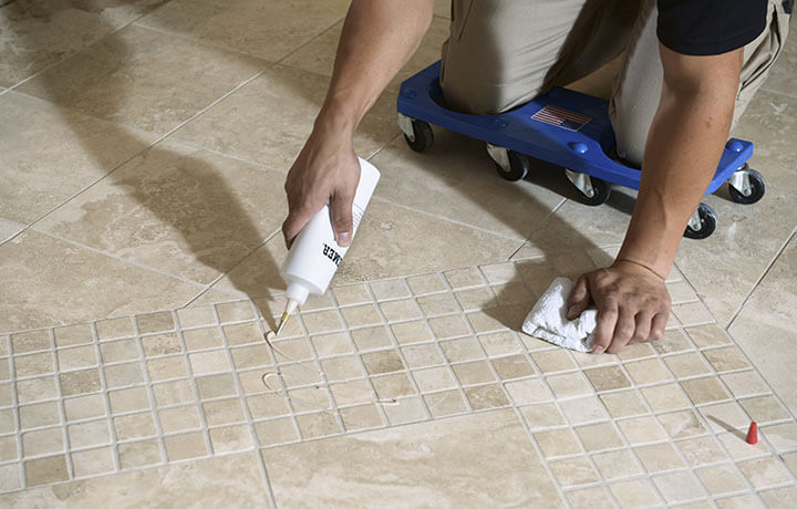 Natural Stone Cleaning Stanley Steemer Stanley Steemer Technician Applying Sealant To Natural Stone Floors